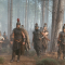 This image shows Matt Damon as Odysseus alongside his men in a misty pine forest scene from Christopher Nolan's epic film adaptation, The Odyssey (2026)